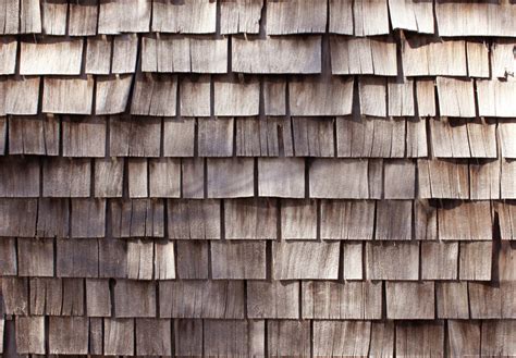 Wood Shingles And Hail Damage On Roof