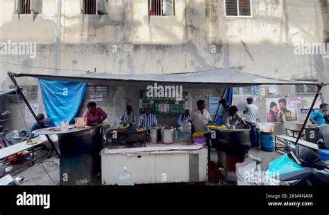 People Eating At Famous Chicken Biryani Stall On The Street Of India