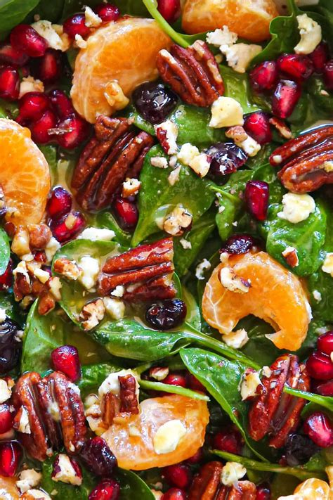 Christmas Salad With Spinach Pecans Mandarin Oranges Pomegranate