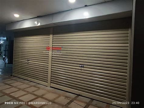 Pemasangan Rolling Door One Sheet Full Perforated Di Ruko Plaza