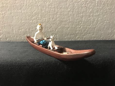 Hergé Statuette Pixi 4546 Tintin et Milou pirogue Catawiki