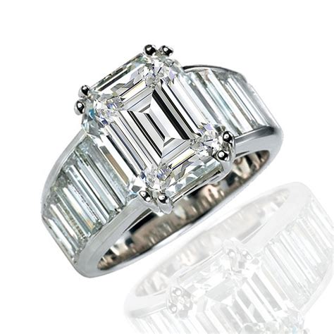 Emerald Cut Multi Stone Engagement Ring With Tapered Baguette Side Stones