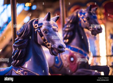 Brilliant Vintage Merry Go Round Wooden Horses Against The Background