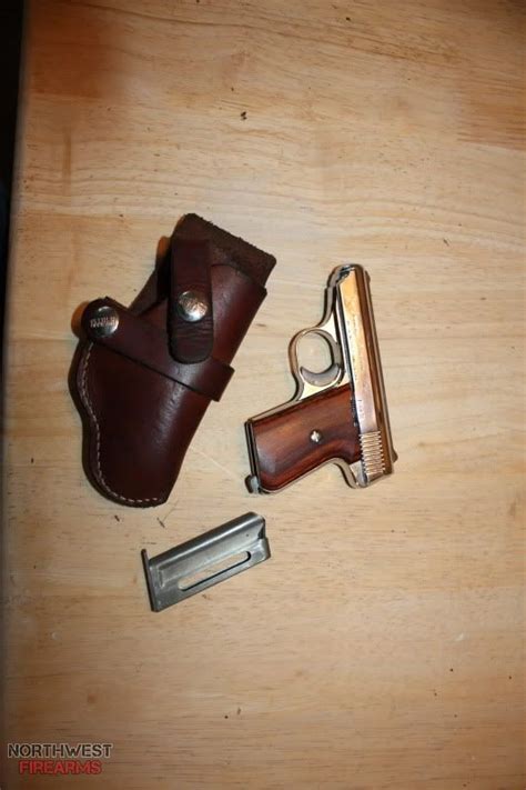 Jennings J22 22 Lr Chrome With Wood Grips And Hunter Holster