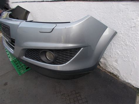 ZDERZAK PRZEDNI OPEL ASTRA H III LIFT Z163 SPRYSKI 7671992672