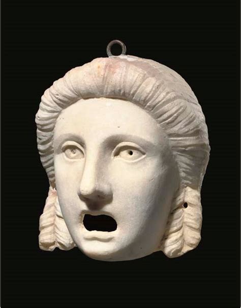 A ROMAN MARBLE THEATRE MASK (OSCILLUM)