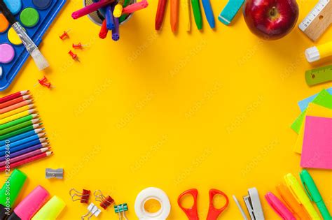 School Supplies On Yellow Background Back To School Concept Stock