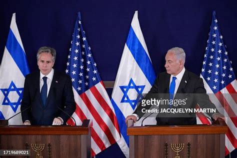 Israeli Prime Minister Benjamin Netanyahu looks on as US Secretary of ...