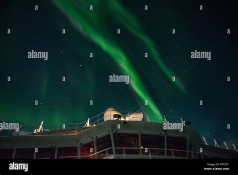 See the Northern lights on a norwegian fjord cruise Stock Photo - Alamy