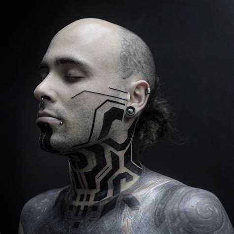 Circuits And Nature Unite In Georgie Williams Futuristic Tattoos