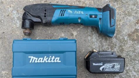 Makita Btm50 18v Multi Tool With Battery And Extras Ebay