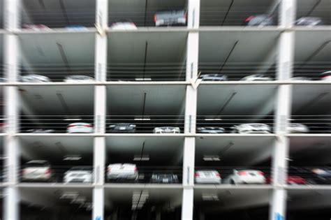 Blurry Image Of Cars Parked In A Parking Lot Stock Photo Download