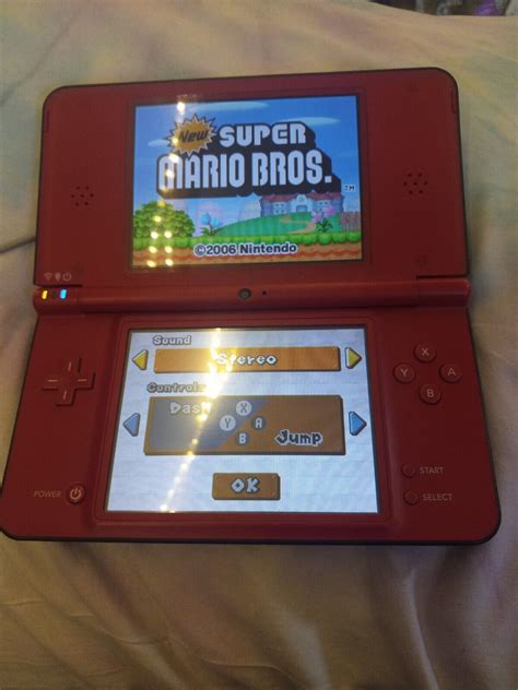 Nintendo DSi XL 25th Anniversary Edition With New Mario Bros Red