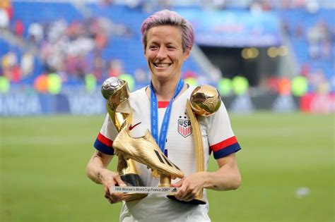 Megan Rapinoe Of The Usa Celebrates With The Fifa Womens World Cup Trophy And Golden Boot