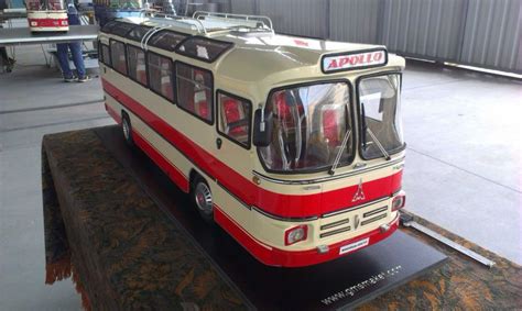 an old bus is on display in a museum