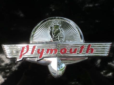 a close up of the emblem on a car's hood ornament that says plymouth