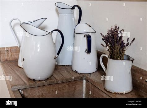 White Enamel Jugs Stock Photo Alamy