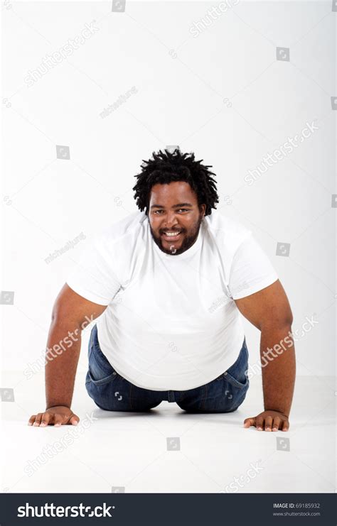 Funny Fat African Man Lying On Stock Photo 69185932 | Shutterstock