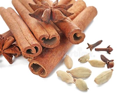 Cinnamon Sticks Cardamom Anise And Dried Cloves On White Background