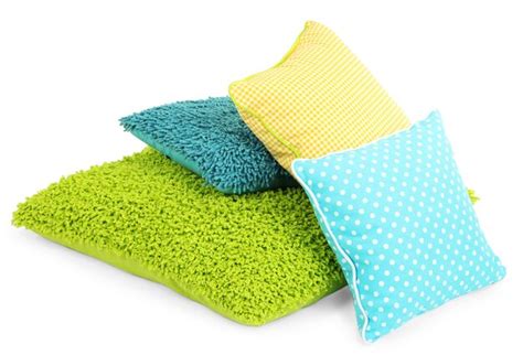 Premium Photo | Colorful pillows isolated on white