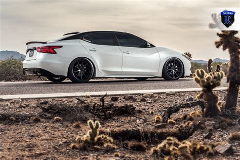 Matte Black Rohana Wheels and Blacked Out Mesh Grille Contrast with White Nissan Maxima — CARiD ...