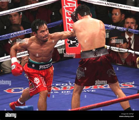 Manny Pacquiao Beats Oscar De La Hoya By Tko In The 8th Round In The Welterweight Boxing Match