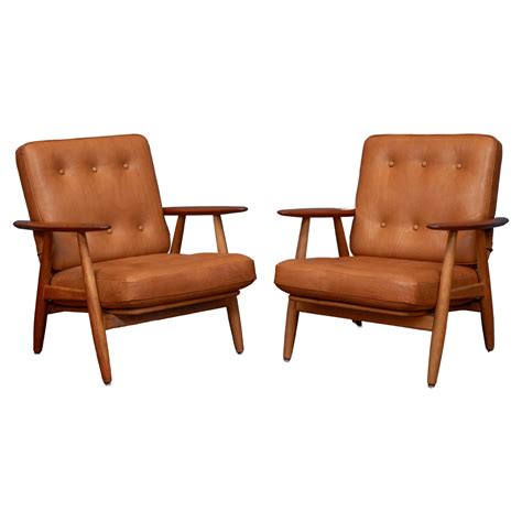 Hans J. Wegner Set of Lounge Chair Model GE-240 and Ottoman in Oak and Teak, 1950s at 1stDibs ...