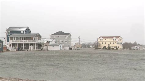 High tide causes flooding in Hampton Beach, NH, during storm