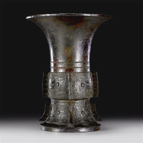 An Archaic Bronze Ritual Wine Vessel Zun Late Shang Dynasty Early