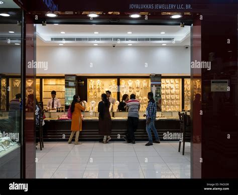 Tourists And Residents Window Shopping At Dubai Gold Souk Market