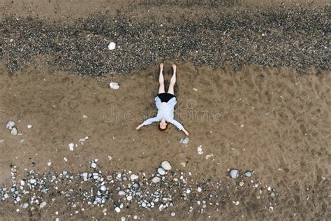 Aerial View of Young Woman Sitting on Beach Stock Image - Image of ...