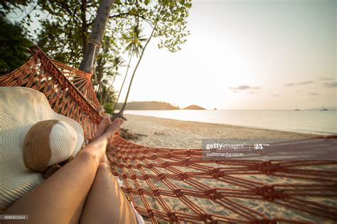 Stock Photo Woman Resting On Hammock On Tropical Beach Beach Bars