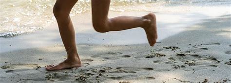 Child Enjoys Summer By River And Beach Splashing And Playing Barefoot ...