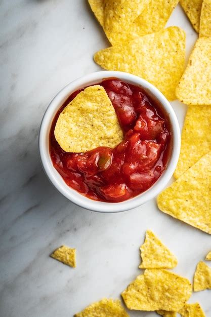 Premium Photo Tortilla Chips And Red Tomato Salsa Dip Mexican Nacho