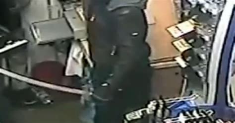 Horrific Moment Two Masked Thugs Armed With Huge Knives Beat Shopkeeper