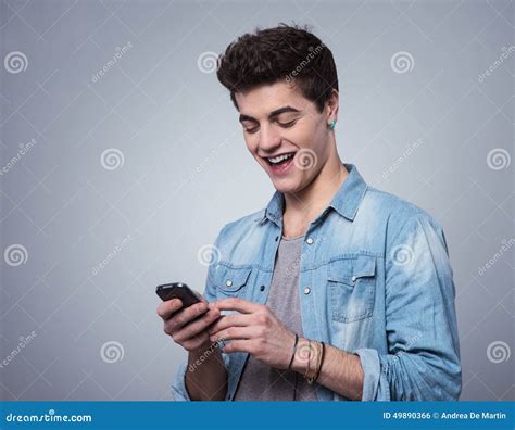 Smiling Guy Texting With Smartphone Stock Photo Image Of Style