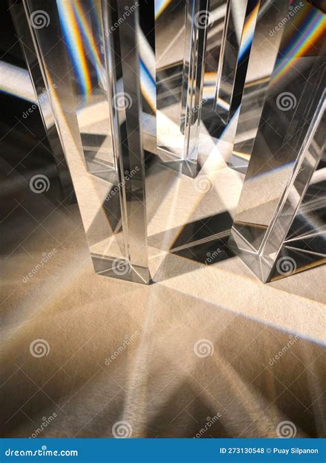 Dispersion Of Light Through A Group Of Clear Triangular Prisms Stock