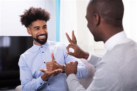 Two Happy Men Making Sign Language Stock Photo - Image of hearing ...