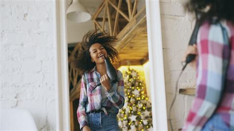 Premium Photo Curly Funny African American Girl Dancing And Singing