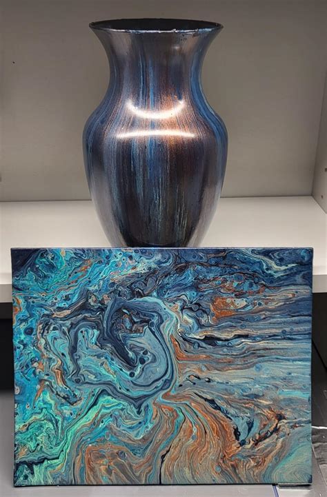 Acrylic pour over clear glass vase. Poured over an 8x10 canvas panel