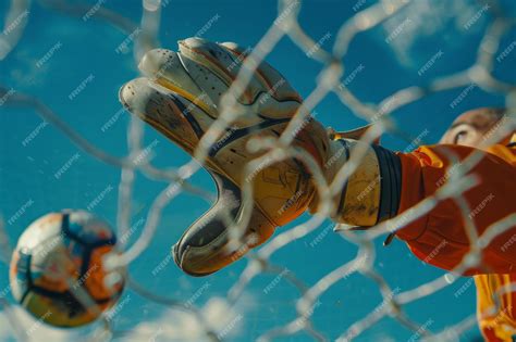 Premium Photo Soccer Goalies Glove And Ball In Front Of Net