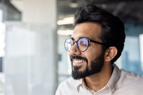 Close Up Photo Of Satisfied And Happy Young Indian Man In Glasses And