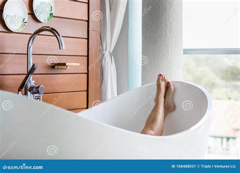 Bare Feet And Legs In A White Tub Stock Image Image Of White Luxury