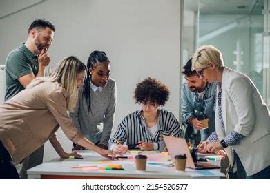 Happy Multiracial Business Team Working Together Stock Photo