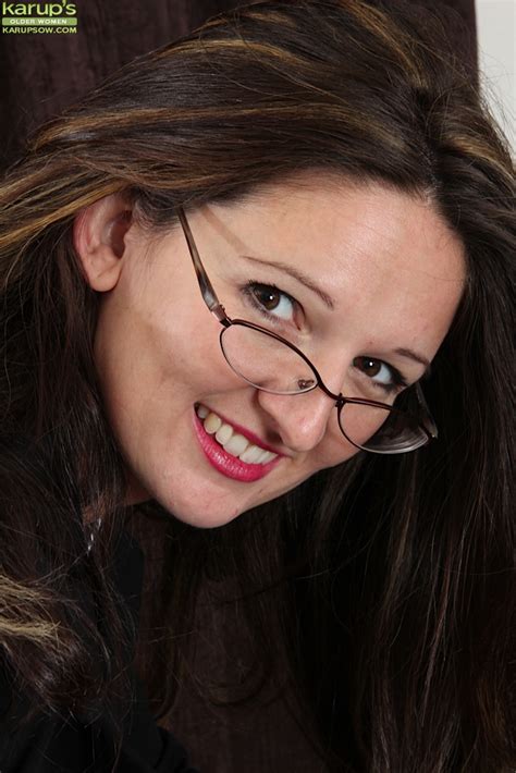 Nasty Brunette Babe Undressing In The Office And Showing Her Butt