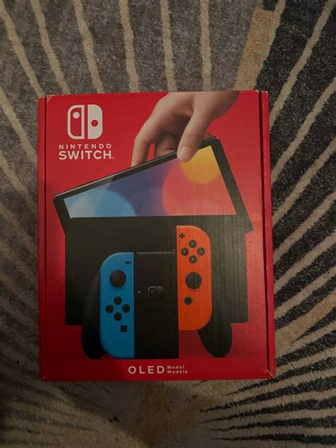 Konsola NINTENDO Switch OLED Model Czerwono Niebieski Poznań Grunwald