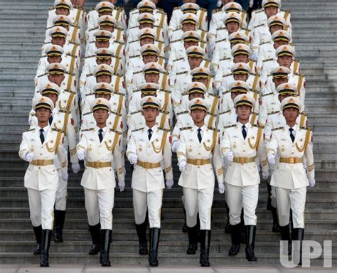 Photo: Chinese soldiers prepare to perform military honor guard duties in Beijing, China ...