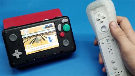 Video This Pocket Sized Portable Plays Gamecube And Wii Games