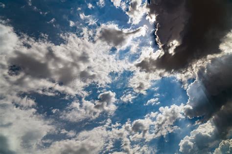 Dark Storm Clouds on a Bright Blue Sky Stock Image - Image of ...