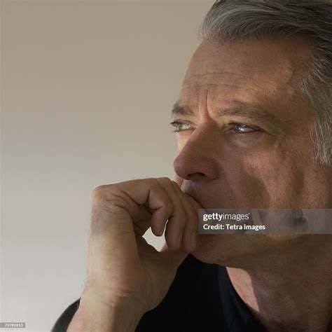 Senior Man With Shadow On Face High-Res Stock Photo - Getty Images